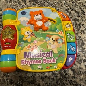 Vtech Musical Rhymes Book - Colorful Interactive Kids Toy (Yellow/Red/Blue)